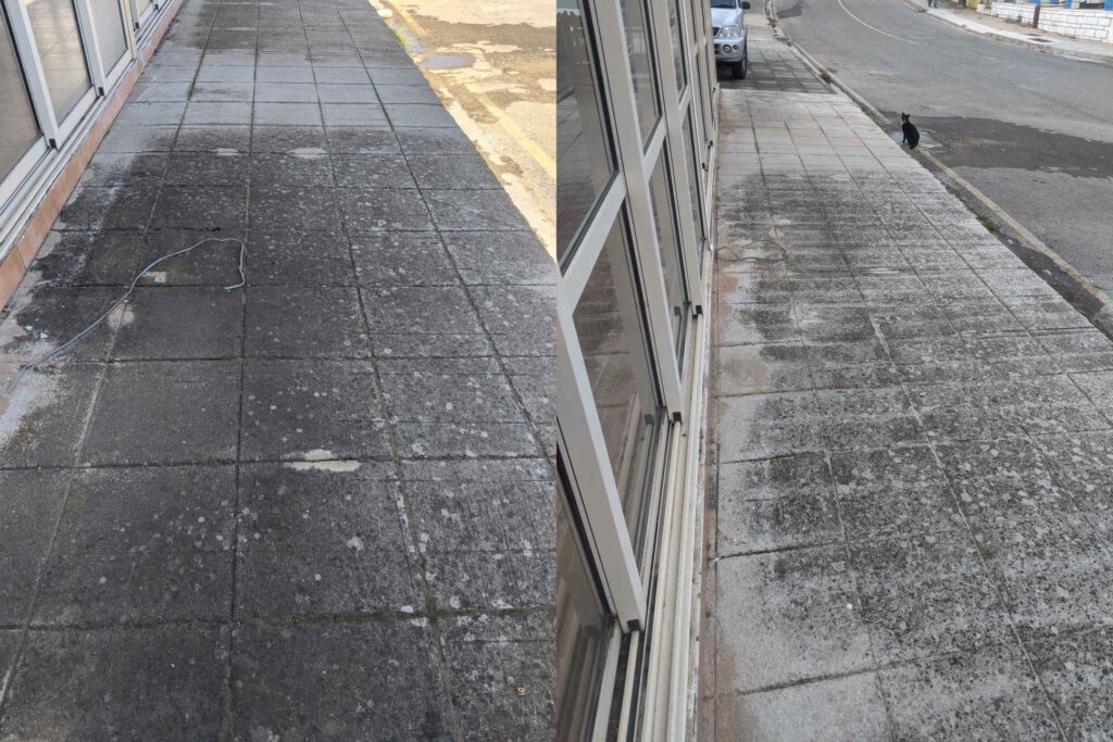 Powerwashing outside Get Wet Divers shop
